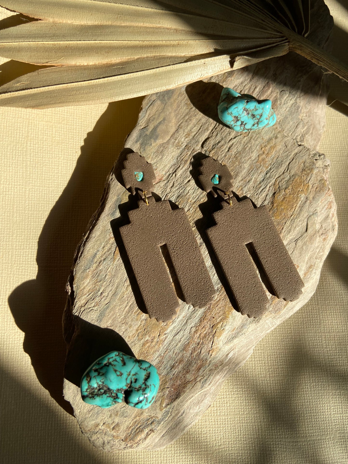 Brown with a touch of turquoise dangle